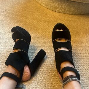Black suede heels. By Stuart weitzman